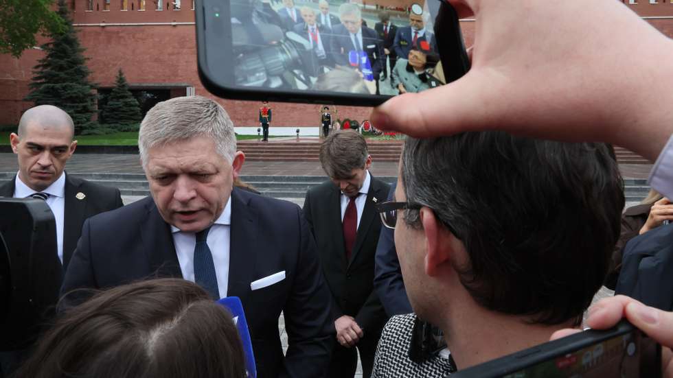 epa12942120 Slovak Prime Minister Robert Fico speaks to journalists after a flower-laying ceremony at the Tomb of the Unknown Soldier by the Kremlin Wall in Moscow, Russia, 08 May 2026.  EPA/SHAMIL ZHUMATOV/ POOL