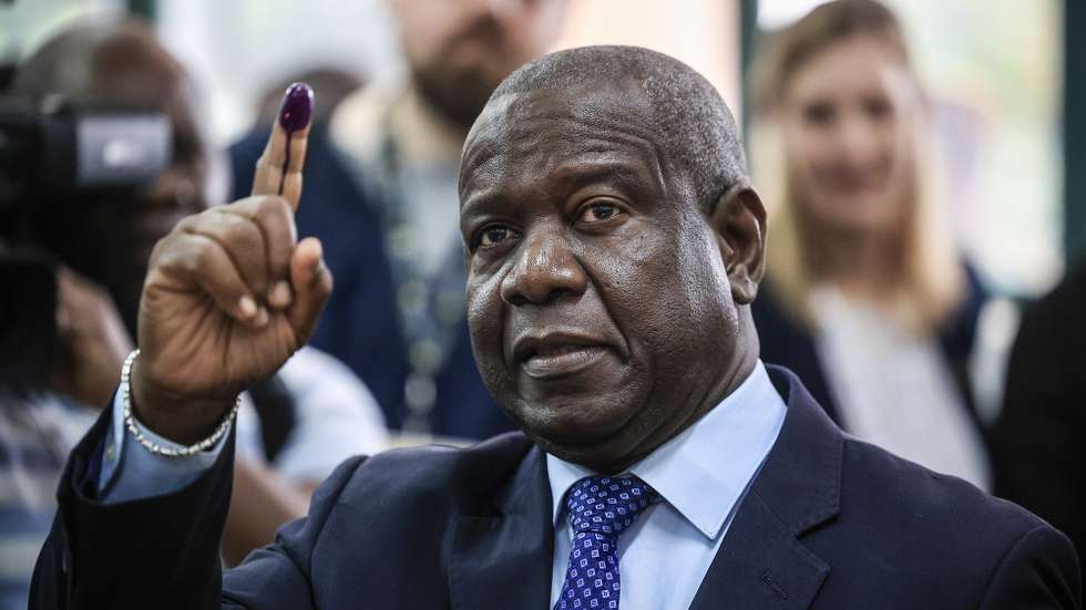 Presidential candidate Lutero Simango, supported by the Democratic Movement of Mozambique (MDM), shows his inked finger after casting his vote at a polling station in Maputo, Mozambique, 09 October 2024. More than 17.1 million Mozambican voters will choose the President of the Republic, provincial assemblies and their governors, and 250 members of the Assembly of the Republic. The National Elections Commission (CNE) approved lists of 35 political parties running for the Assembly of the Republic and 14 political parties and groups of citizen voters for provincial assemblies. JOSE COELHO/LUSA