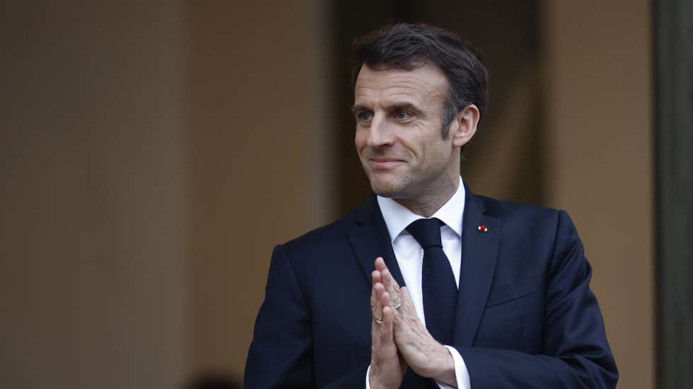 epa10541251 French President Emmanuel Macron gestures as he welcomes Costa Rica President Rodrigo Chaves Robles (not pictured) at the Elysee Palace in Paris, France, 24 March 2023.  EPA/YOAN VALAT