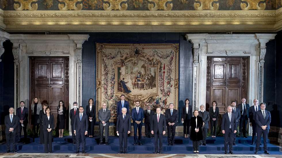 epa09008827 A handout picture made available by the Quirinal Presidential Palace (Palazzo del Quirinale) Press Office shows Italian President Sergio Mattarella (C-L) and Prime Minister Mario Draghi (C-R) during the new government's swearing-in ceremony at the Quirinal Palace, in Rome, Italy, 13 February 2021. In picture are seen (L-R, first row) Daniele Franco, Marta Cartabia, Luigi Di Maio, Sergio Mattarella, Mario Draghi, Luciana Lamorgese, Lorenzo Guerini, Giancarlo Giorgetti, (L-R, second row) Roberto Speranza, Maria Cristina Messa, Andrea Orlando, Roberto Cingolani, Stefano Patuanelli, Enrico Giovannini, Patrizio Bianchi, Dario Franceschini, Federico D'Inca, (L-R, third row) Erika Stefani, Fabiana Dadone, Maria Stella Gelmini, Vittorio Colao, Renato Brunetta, Mara Carfagna, Elena Bonetti and Massimo Garavaglia.  EPA/PAOLO GIANDOTTI/QUIRINAL PALACE PRESS OFFICE HANDOUT  HANDOUT EDITORIAL USE ONLY/NO SALES
