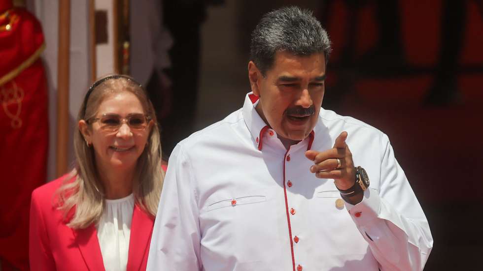 epa11298676 The president of Venezuela, Nicolas Maduro (C) prepares with the first lady Cilia Flores (L), to receive the leaders who will participate in the ALBA Summit at the Miraflores Palace, in Caracas, Venezuela, 24 April 2024. The XXIII Summit of the Bolivarian Alliance for the Peoples of Our America (ALBA) brings together in Caracas presidents of several bloc countries, among them, the Cuban Miguel Diaz-Canel, the Nicaraguan Daniel Ortega, and the Bolivian Luis Arce, who will meet with their Venezuelan counterpart Nicolas Maduro in a conclave in which they will address issues of common interest.  EPA/Miguel Gutierrez