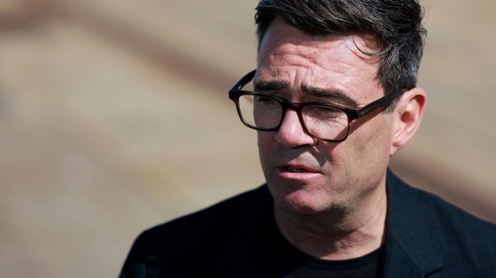epa13136028 British Prime Minister Andy Burnham looks on during a visit to HM Naval Base with Ukraine's President Volodymyr Zelensky in Portsmouth, Britain, 27 July 2026. 'The key priorities are air defense, maritime security, and joint defense production', Zelenskyy said in a social media post on his arrival to Portsmouth.  EPA/JASON ALDEN / POOL