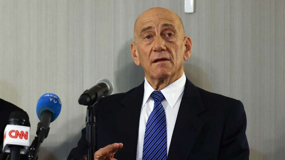 epa08211924 Former Israeli Prime Minister Ehud Olmert and Palestinian President Mahmoud Abbas (Unseen) hold a joint press conference at the Grand Hyatt Hotel in New York, New York, USA, 11 February 2020.  EPA/JASON SZENES