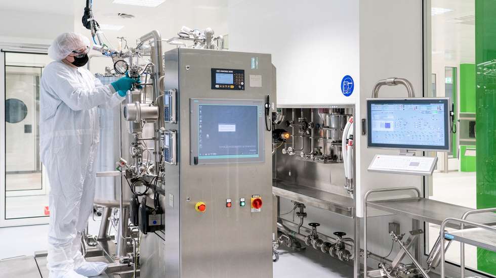 epa09014328 A handout photo made available by German pharmaceuticals company Bayer shows an employee at work in the future mRNA production site of CureVac's Corona vaccine CVnCoV at the Bayer AG plant amid the on-going Covid-19 pandemic, in Wuppertal, Germany, 15 February 2021. The production of the CureVac vaccine is to take place, among other places, at Bayer's 'Biotechnikum' in Wuppertal.  EPA/BAYER AG / HANDOUT  HANDOUT EDITORIAL USE ONLY/NO SALES