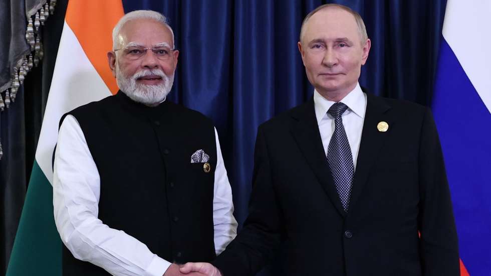 epa12342054 Indian Prime Minister Narendra Modi (L) and Russian President Vladimir Putin shake hands as they pose for a photograph before a bilateral meeting on the sidelines of the Shanghai Cooperation Organisation (SCO) summit in Tianjin, China, 01 September 2025.  EPA/ALEXANDER KAZAKOV/SPUTNIK/KREMLIN POOL MANDATORY CREDIT