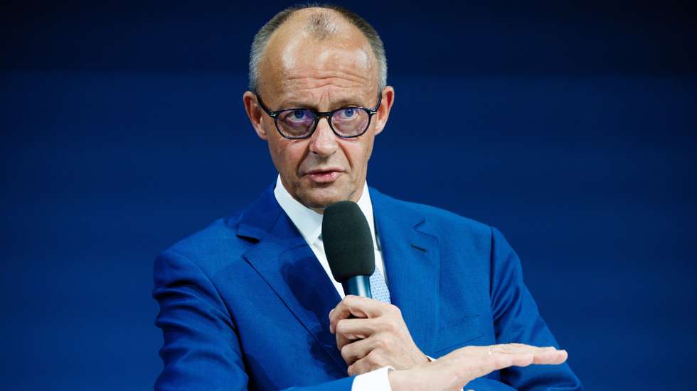epa13287324 German Chancellor Friedrich Merz delivers a speech during the 'Germany Summit' in Berlin, Germany, 07 October 2026. The business conference is organized by Handelsblatt newspaper in partnership with WirtschaftsWoche magazine, under the motto 'Blueprint for a new economic miracle', and brings together high-level political leaders, executives, and economic experts.  EPA/CLEMENS BILAN