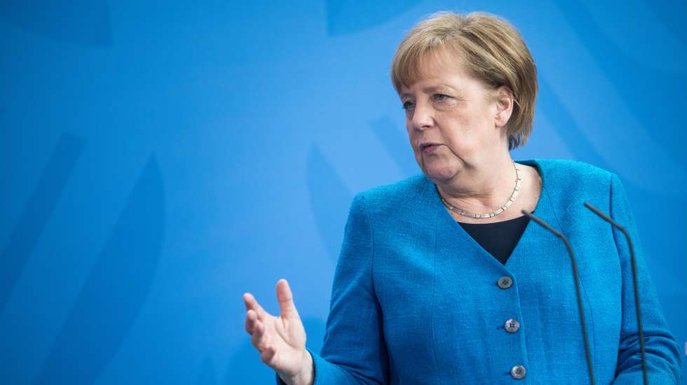 epa09185414 German Chancellor Angela Merkel speaks to the media following a virtual meeting of the European Council and an EU summit with India during the coronavirus pandemic in Berlin, Germany, 08 May 2021. Central to the meetings, which included India's Prime Minister Narendra Modi, were the resumption of free trade talks with India.  EPA/STEFFI LOOS / POOL