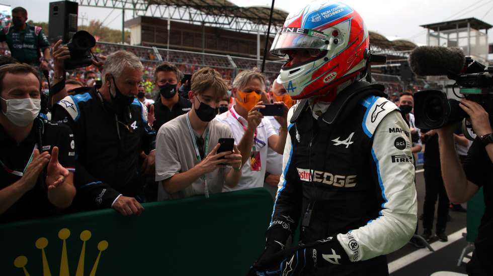 epa09386039 French Formula One driver Esteban Ocon of the Alpine F1 Team reacts after winning the Formula One Grand Prix of Hungary at the Hungaroring circuit in Mogyorod, near Budapest, Hungary, 01 August 2021.  EPA/Florion Goga / POOL