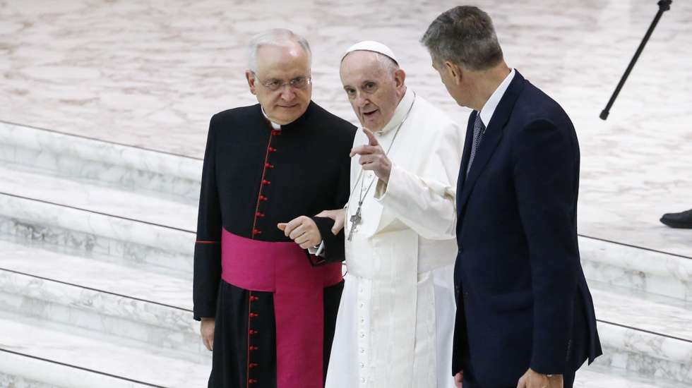 epa09393768 Pope Francis  (C) attends to a general audience in the Paul VI Hall, exactly one month after his colon surgery at Rome's Gemelli Polyclinic, Vatican City, 04 Aug 2021.  EPA/FABIO FRUSTACI