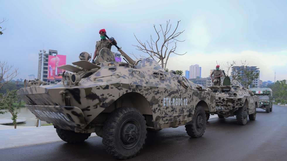 epa09560033 (FILE) The Ethiopian National Defence conducts exercises in the inaugural event of Sheger park during a military parade in Addis Ababa, Ethiopia, 10 September 2020 (issued 02 November 2021). A nationwide state of emergency effective immediately has been declared by the Ethiopia's Council of Ministers on 02 November 2021, following a push towards the capital city announcement made by the Northern Tigray region fighters on 01 November 2021.  EPA/STR *** Local Caption *** 56523174