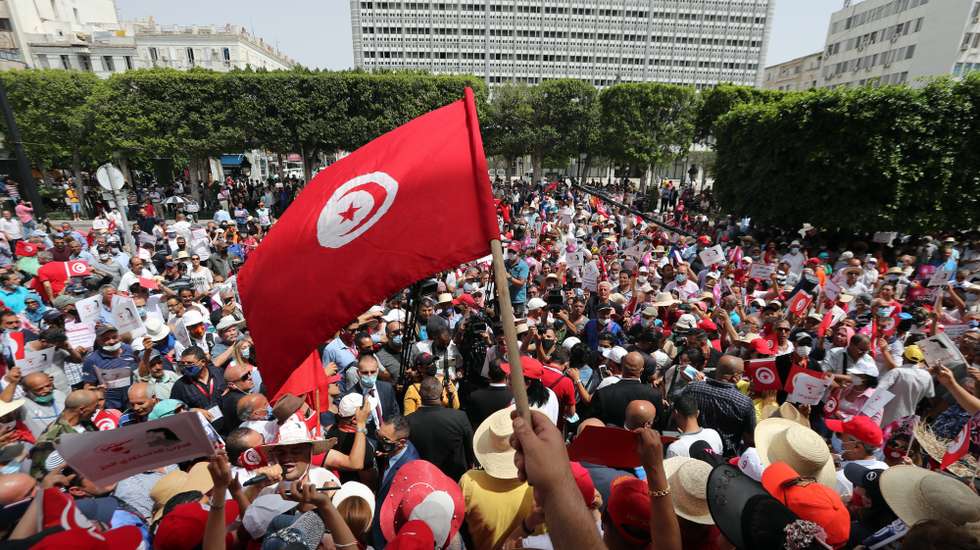 epa09285695 Supporters of the Free Destourian Party (Free Constitutional Party) shout slogans during protest during a demonstration against political Islamist party Ennahda and the government in Tunis, Tunisia, 19 June 2021. According to the President of the Free Destourian Party, Abir Moussi, "The national dialogue is useless because the political class is precisely the cause of all the problems. Those who are for the dialogue aim only to artificially prolong the duration of a system which allows them to remain in power where in facade opposition".  EPA/MOHAMED MESSARA