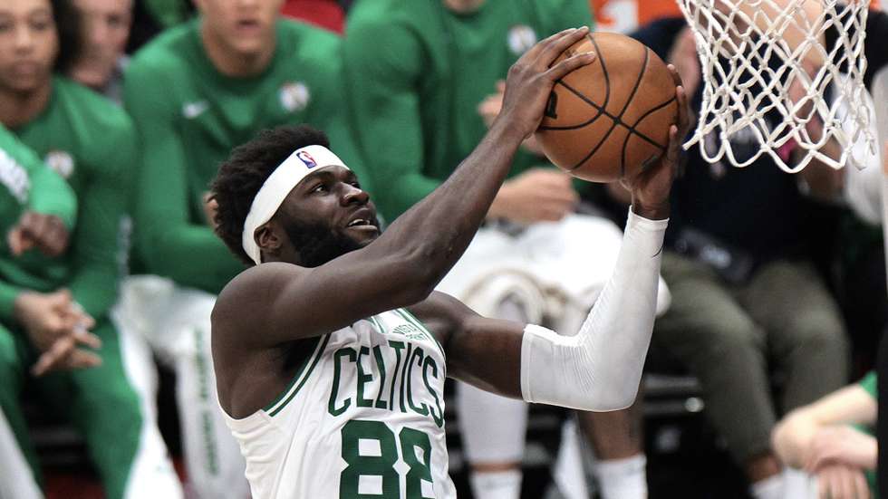 epa11042646 Boston Celtics center Neemias Queta lays up the ball during the second half of the NBA basketball game between the Boston Celtics and Los Angeles Clippers in Los Angeles, California, USA, 23 December 2023.  EPA/ALLISON DINNER  SHUTTERSTOCK OUT