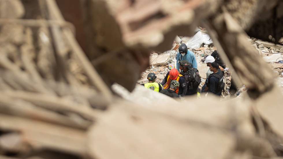 epa13071482 Rescuers search for missing people in an area affected by the earthquake in Catia La Mar, Venezuela, 28 June 2026.  EPA/Ronald Pena R