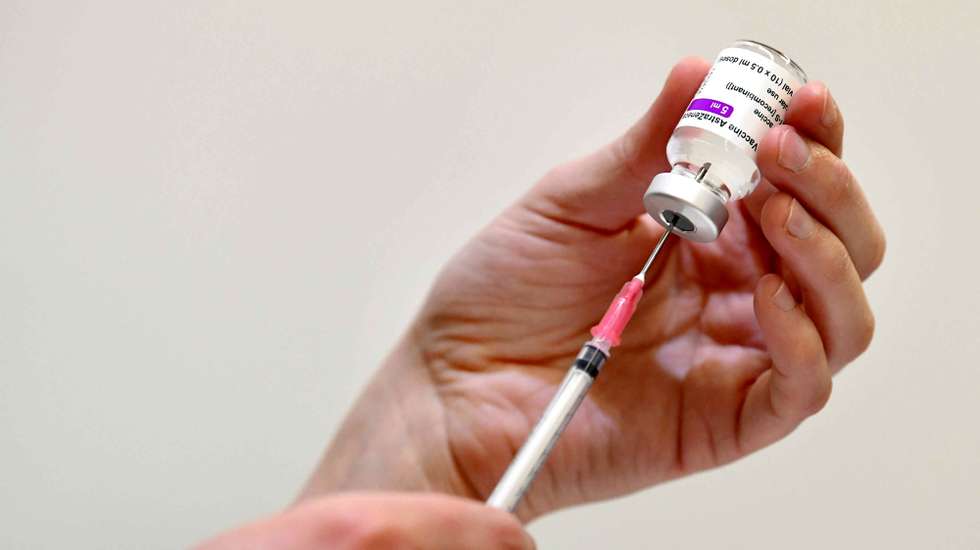 epa09085987 A doctor vaccinates a client with AstraZeneca's Covid-19 vaccine in Ede, the Netherlands, 20 March 2021. EU member countries reintroduced the AstraZeneca Covid-19 vaccine in their inoculation campaigns following the European Medicines Agency (EMA) announcement of 18 March to uphold its approval of the vaccine. Some countries stopped giving the vaccine over fears there might be links between the vaccination against Covid-19 with the AstraZeneca vaccine and a rare number of blood clots.  EPA/Piroschka van de Wouw
