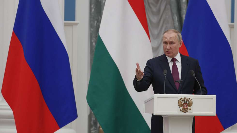 epa09721526 Russian President Vladimir Putin gestures speaking at the  press-conference with Hungarian Prime Minister Viktor Orban during their meeting in the Moscow Kremlin, Russia, 01 February 2022. Hungary is interested in increasing the volume of Russian gas supplies, Prime Minister Viktor Orban said.  EPA/YURI KOCHETKOV