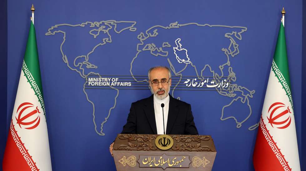epa10068245 Iran's newly-appointed Foreign Ministry spokesman Nasser Kanani speaks during his first press conference in Tehran, Iran, 13 July 2022. According to Iranian foreign ministry, Kanani said that the nuclear talks are under way and the time and place for the next round will be announce soon.  EPA/AREF TAHERKENAREH