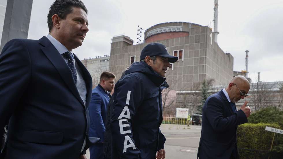 epa10548564 A picture taken during a visit to Enerhodar organized by the Russian military shows International Atomic Energy Agency (IAEA) Director-General Rafael Mariano Grossi (C) and agency members examining the Zaporizhzhia Nuclear Power Plant (ZNPP) in Enerhodar, southeastern Ukraine, 29 March 2023. According to Ukrainian national nuclear energy company Energoatom, 'Grossi plans to see how the situation at the ZNPP has changed, talk to the staff working there, and act as a guarantor of the rotation of members of the IAEA’s permanent mission, which has been at the ZNPP since September 2022.'  EPA/SERGEI ILNITSKY