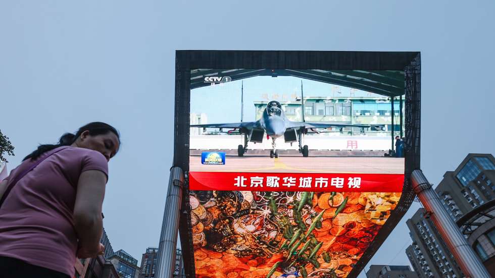 epa11363068 A screen broadcasts the evening news about China conducting military drills around Taiwan, in Beijing, China, 23 May 2024. According to Chinese state media Xinhua, 'the Eastern Theater Command of the Chinese People's Liberation Army (PLA) started a two-day joint military drills surrounding the island of Taiwan on 23 May'. Taiwan's Defense Ministry stated on 23 May that China was engaging in 'irrational provocation' by encircling Taiwan with its ongoing military exercises, just days after President William Lai's inauguration.  EPA/WU HAO