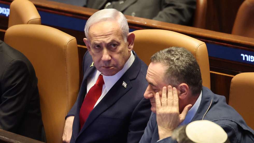epa12255989 Israeli Prime Minister Benjamin Netanyahu (C) attends a plenary session to vote on a bill for applying Israeli sovereignty over the West Bank territory, at the Knesset, the Israeli parliament, in Jerusalem, 23 July 2025. The bill, submitted by the Religious Zionist Party, calls for the imposition of Israeli sovereignty over the occupied West Bank, and the use of 'Judea and Samaria' instead of West Bank in Israel's legislation.  EPA/ABIR SULTAN