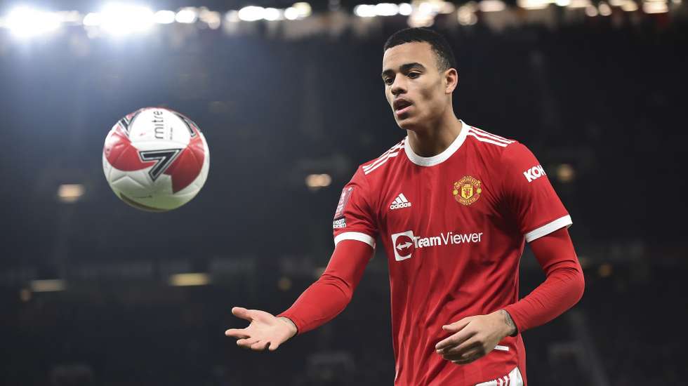 epa09718478 (FILE) - Manchester United's Mason Greenwood reacts during the English FA Cup third round soccer match between Manchester United and Aston Villa in Manchester, Britain, 10 January 2022 (reissued 30 January 2022). English Premier League club Manchester United on 30 January 2022 released a statement saying Greenwood "will not return to training or play matches until further notice" amid accussations that the player had physically assaulted his ex-girlfriend.  EPA/Peter Powell EDITORIAL USE ONLY. No use with unauthorized audio, video, data, fixture lists, club/league logos or 'live' services. Online in-match use limited to 120 images, no video emulation. No use in betting, games or single club/league/player publications