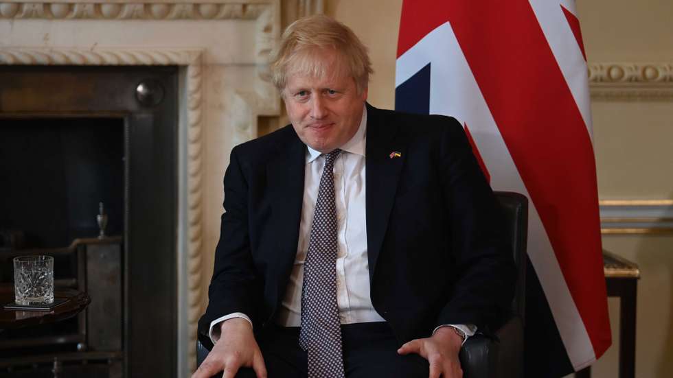 epa09878345 British Prime Minister Boris Johnson looks on during his meeting with German Chancellor Olaf Scholz (not pictured) at 10 Downing Street in London, Britain, 08 April 2022.  EPA/NEIL HALL / POOL