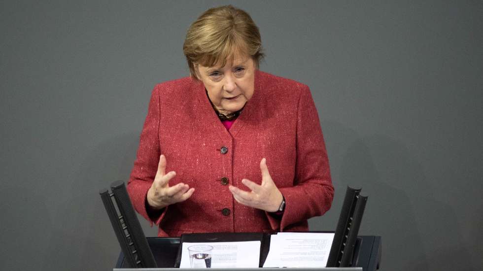 epa08871915 German Chancellor Angela Merkel speaks during a session of the German parliament 'Bundestag' in Berlin, Germany, 09 December 2020. Members of Bundestag debated in a general discussion on the government's policy.  EPA/HAYOUNG JEON
