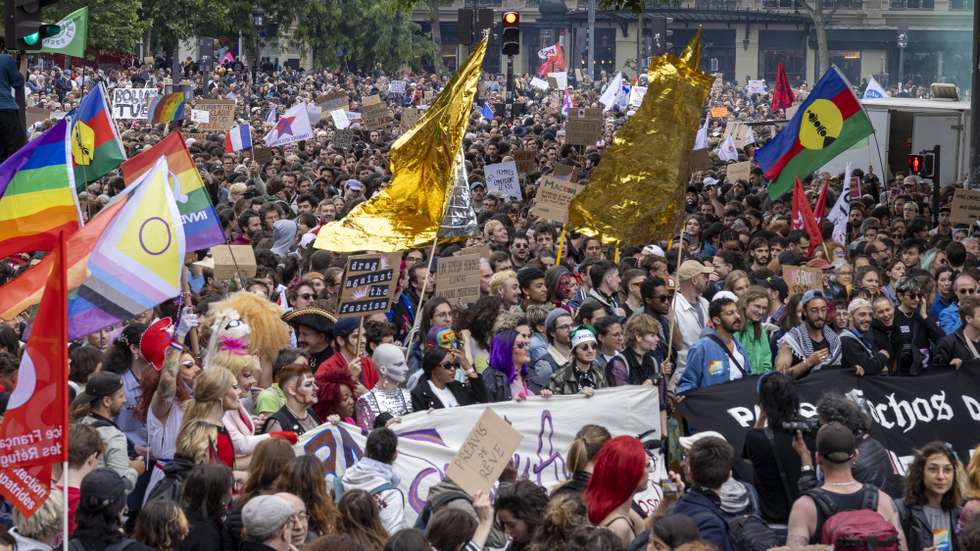 epa11411996 People take part in a demonstration against the French far right party National Rally (Rassemblement National or RN) following the results of the European elections, in Paris, France, 15 June 2024. Syndicates, several associations called for a protest against the RN following the French president Emmanuel Macron announcement on 09 June to dissolve the National Assembly and to call for new elections on 30 June and 07 July.  EPA/ANDRE PAIN