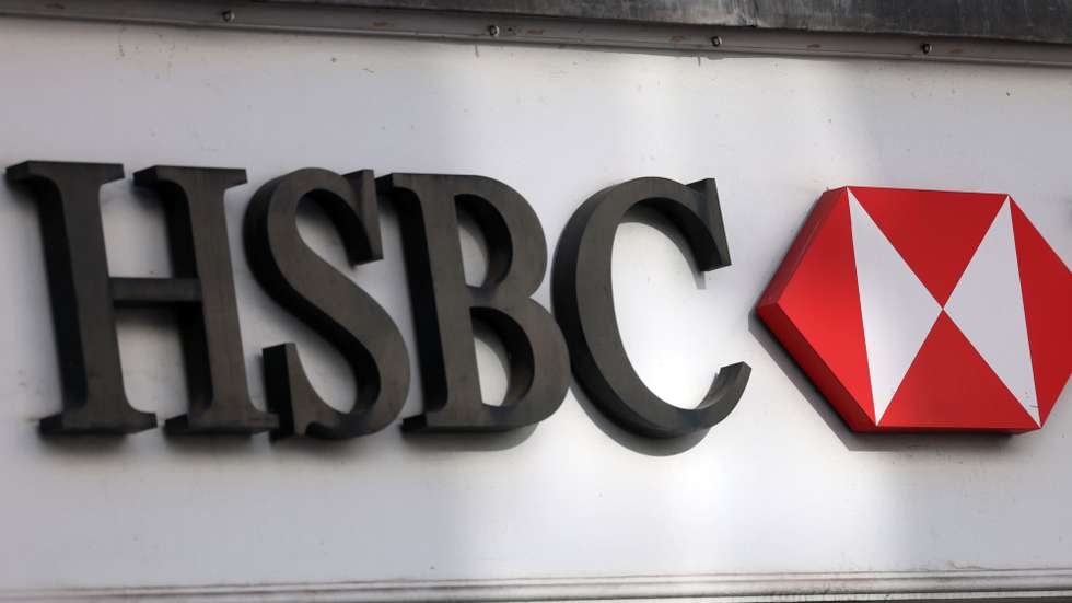 epa12775995 A sign outside a branch of HSBC bank in London, Britain, 25 February 2026. The bank has announced a pre-tax fall in profits of seven percent to $29.9bn in 2025. However, HSBC saw its shares rise by five percent during morning trading following the announcement of  results on the 25 February.  EPA/ANDY RAIN