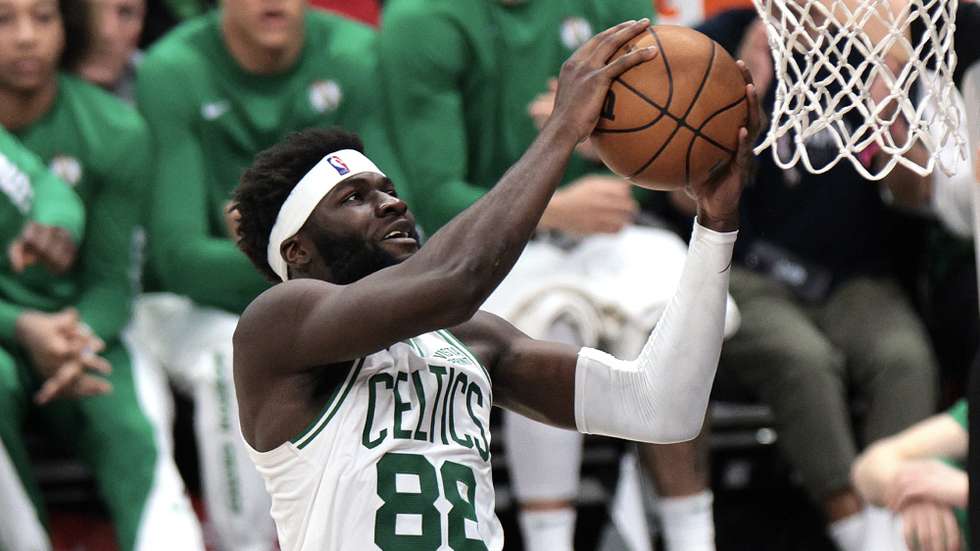 epa11042646 Boston Celtics center Neemias Queta lays up the ball during the second half of the NBA basketball game between the Boston Celtics and Los Angeles Clippers in Los Angeles, California, USA, 23 December 2023.  EPA/ALLISON DINNER  SHUTTERSTOCK OUT