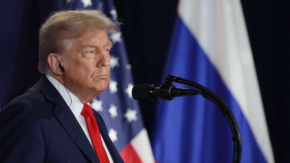 epa12303736 US President Donald Trump listens to Russian President Vladimir Putin during a joint news conference following their meeting at Joint Base Elmendorf-Richardson in Anchorage, Alaska, USA, 15 August 2025.  EPA/GAVRIIL GRIGOROV/SPUTNIK/KREMLIN POOL / POOL MANDATORY CREDIT