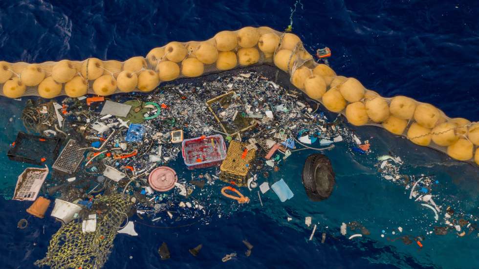epa07892087 A handout photo made available by The Ocean Cleanup shows the company's ocean cleanup prototype System 001/B capturing plastic debris in the Great Pacific Garbage Patch, in the Pacific Ocean, 30 September 2019 (issued 03 October 2019). The self-contained system uses natural currents of the sea to passively collect plastic debris in an effort to reduce waste in the ocean. According to the Ocean Cleanup, the system is also able to filter microplastics as small as 1mm.  EPA/THE OCEAN CLEANUP HANDOUT  HANDOUT EDITORIAL USE ONLY/NO SALES
