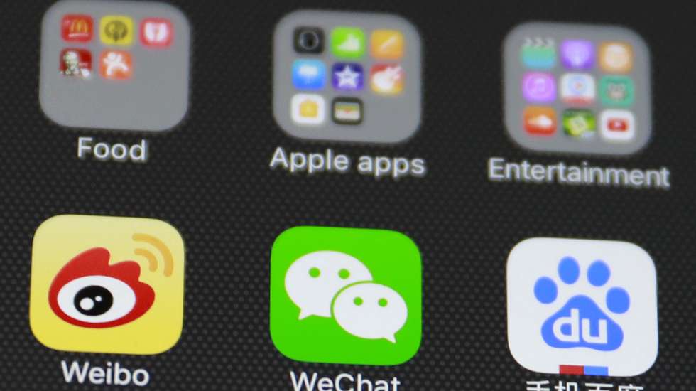 Icones de redes sociais chinesas como a Weibo