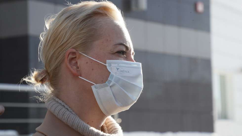epa08979502 The wife of Russian opposition leader Alexei Navalny, Yulia Navalnaya, leaves after hearing at the Shcherbinsky district court in Moscow, Russia, 01 February 2021. Yulia Navalnaya was detained during an unauthourized rally in support of her husband 31 January 2021. The court has found Yulia Navalnaya guilty of participating in an unsanctioned rally and fined her.  EPA/MAXIM SHIPENKOV