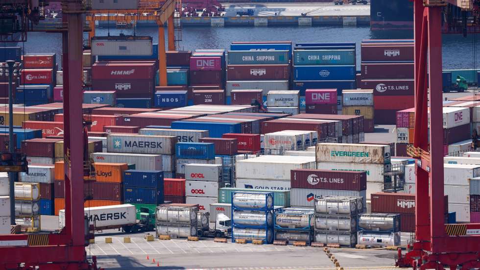 epa12287714 Shipping containers are being moved at the port in Keelung City, Taiwan, 07 August 2025. On 06 August, U.S. President Donald Trump announced that the United States intends to impose a tariff of approximately 100 percent on imported semiconductor chips, with exemptions for companies that are building or have committed to building manufacturing facilities in the United States. Taiwan, as the home of the world-leading chipmaker Taiwan Semiconductor Manufacturing Co. (TSMC), is a significant player in the global supply chain for semiconductors, which are essential for products ranging from smartphones and cars to military equipment.  EPA/RITCHIE B. TONGO