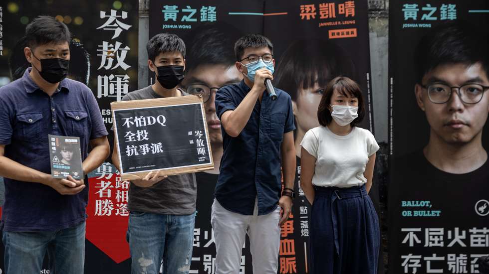 epa09180129 (FILE) - Pro-democracy primary candidates for the legislative election Lester Shum (2-L), Joshua Wong (2-R), and Jannelle Leung (R), canvas for votes in Hong Kong, China, 11 July 2020 (reissued 06 May 2021). Wong, currently serving jail time over another protest-related case, was sentenced to 10 more months in prison on 06 May for participating in an unauthorised assembly on 04 June 2020 to mark China's 1989 Tiananmen protest crackdown. District councillors Lester Shum, Tiffany Yuen and Jannelle Leung were also sentenced from 4 to 6 months for their role in the same vigil.  EPA/JEROME FAVRE
