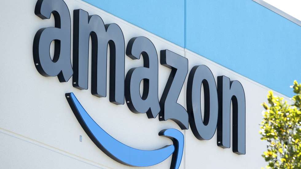 epa10390898 The Amazon logo at an Amazon logistic center in Miami, Florida, USA, 05 January 2023. According CEO Andy Jassy, Amazon is planning to lay off more than 18,000 employees as part of a workforce reduction.  EPA/CRISTOBAL HERRERA-ULASHKEVICH