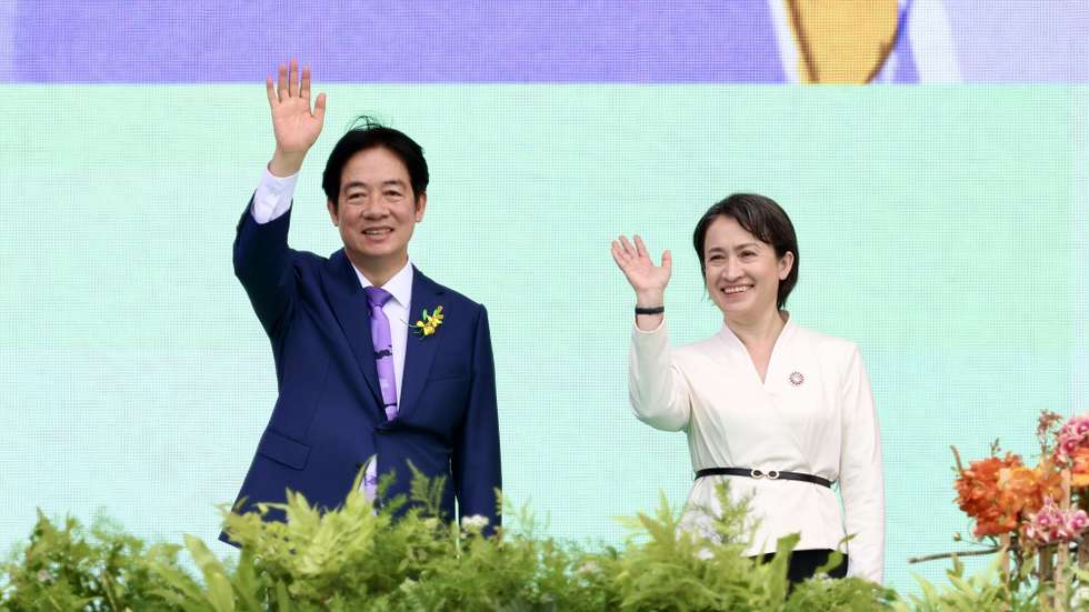epa11354643 Taiwan President William Lai (Lai Ching-te)(L) and Vice President Hsiao Bi-khim (R) wave to the crowd during the Taiwan Presidential Inauguration, in Taipei, Taiwan, 20 May 2024. William Lai (Lai Ching-te) became Taiwan's 16th president on 20 May, taking over incumbent Tsai Ing-wen.  EPA/RITCHIE B. TONGO