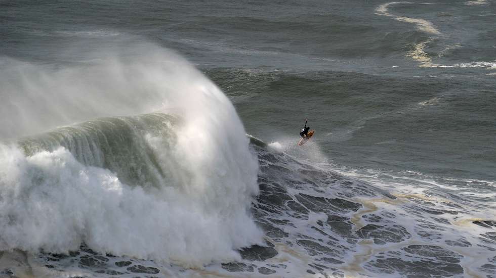 The Portuguese surfer, Hugo Vau, from the Portugal team, in action during the Nazare Tour Surfing Challenge, the 5th stage of the Big Wave Tour, of the World Surf League (WSL), which takes place in Praia do Norte, Nazaré, 11th February 2020. CARLOS BARROSO/LUSA