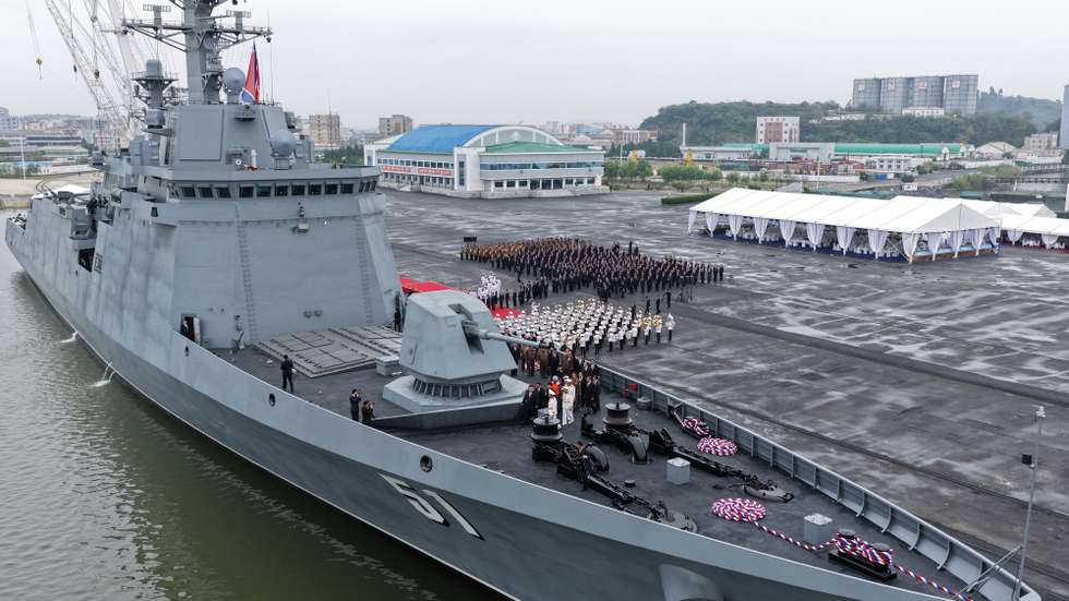 epa12434037 A photo released by the official North Korean Central News Agency (KCNA) shows North Korean leader Kim Jong Un presiding over a ceremony during a visit to the 'Choe Hyon' naval detroyer of the Navy of the Korean People's Army, as part of the Defence Development-2025 military hardware exhibition, at an undisclosed location in North Korea, 05 October 2025 (issued 06 October 2025).  EPA/KCNA  EDITORIAL USE ONLY