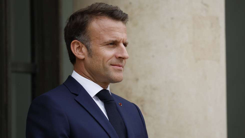 epa11339847 French President Emmanuel Macron stands outside the Elysee Palace, as he awaits guests of the Summit on Clean Cooking in Africa in Paris, France, 14 May 2024.  EPA/YOAN VALAT