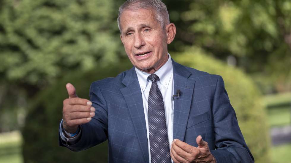epa09419588 Anthony Fauci, director of the US National Institute of Allergy and Infectious Diseases (NIAID) participates in a television interview at the White House in Washington, DC, USA, 18 August 2021. President Biden said top federal health officials recommend that all Americans get a booster shot eight months after becoming fully vaccinated against COVID-19.  EPA/SHAWN THEW