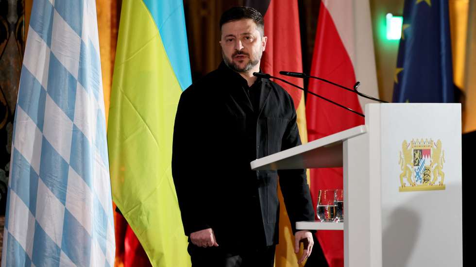 epa12740655 Ukrainian President Volodymyr Zelensky speaks after receiving the Ewald von Kleist Award at the 62nd Munich Security Conference (MSC) in Munich, Germany, 14 February 2026. Ukrainian President Volodymyr Zelensky accepts the Ewald von Kleist Prize on behalf of the Ukrainian people.  EPA/RONALD WITTEK