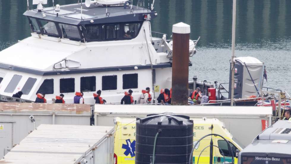 epa12242770 A group of people believed to be migrants is brought to Dover Marina from a UK Border Force vessel following small boat incidents in the English Channel in Dover, Kent, Britain, 17 July 2025. The British and French governments recently agreed to a deal that allows undocumented migrants arriving in the UK via small boats to be returned to France under a ‘one in, one out’ scheme intended to reduce migrant crossings of the Channel.  EPA/TOLGA AKMEN
