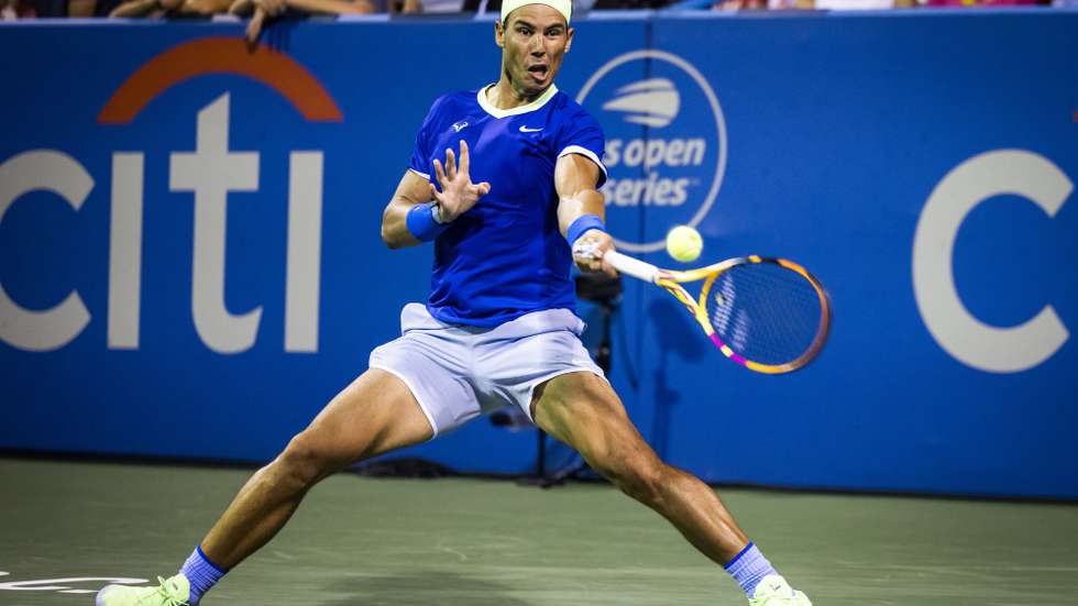 epa09399121 Rafael Nadal from Spain in action against Lloyd Harris from South Africa during their third round men's singles match of the Citi Open ATP tennis tournament at the Rock Creek Park Tennis Center in Washington, DC, USA, 05 August 2021.  EPA/JIM LO SCALZO