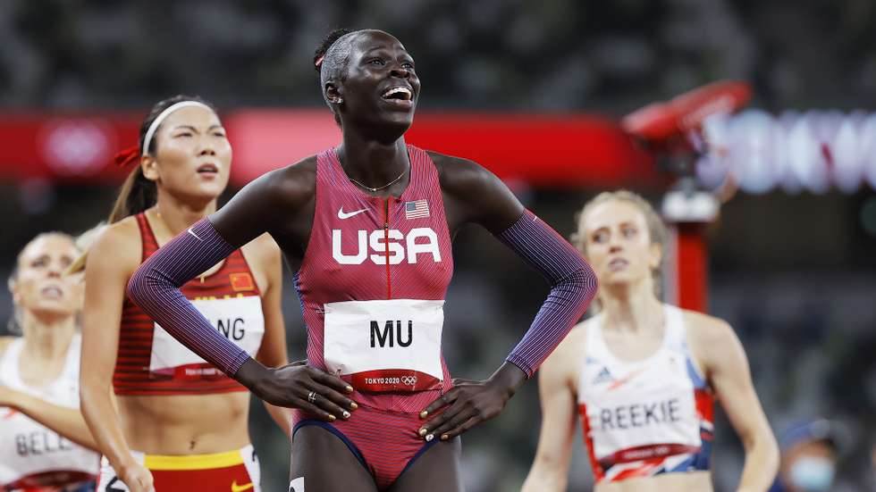 epa09391492 Athing Mu of the US smiles after winning the Women's 800m final at the Athletics events of the Tokyo 2020 Olympic Games at the Olympic Stadium in Tokyo, Japan, 03 August 2021.  EPA/VALDRIN XHEMAJ
