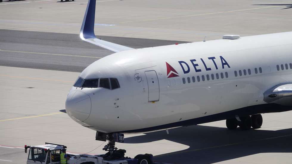 epa08937237 (FILE) - A Boeing 767-332 of Delta Air Lines is moved from the parking position prior to take-off at the Frankfurt airport, Germany, 08 May 2018 (reissued 14 January 2021). Delta Airlines on 14 January 2021 released their 2020 results saying their December quarter 2020 GAAP pre-tax loss stood at 1.1 billion USD and loss per share of 1.19 USD on total revenue of 4.0 billion USD, while December quarter 2020 adjusted pre-tax loss of 2.1 billion USD and adjusted loss per share of 2.53 USD on adjusted operating revenue of 3.5 billion USD. Full year 2020 GAAP pre-tax loss stood at 15.6 billion USD and loss per share of 19.49 USD on total revenue of 17.1 billion USD. Full year 2020 adjusted pre-tax loss was 9.0 billion and adjusted loss per share of 10.76 USD on adjusted operating revenue of 15.9 billion USD.  EPA/MAURITZ ANTIN *** Local Caption *** 54316176