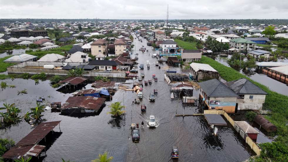 epa10256859 An aerial view shows the aftermath of the flooded landscape of Yenagoa, the capital town of Bayelsa, Nigeria, 21 October 2022. The flood situation is worsening in Nigeria, particularly in southern areas where many people have been displaced from their homes, according to Bayelsa Governor Douye Diri.  EPA/STRINGER