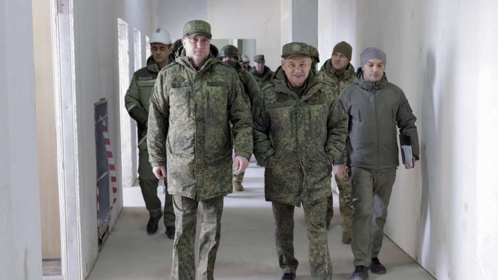 epa10505920 A handout photo made available by the Russian Defence Ministry's Press Service on 06 March 2023 shows Russia's Defence Minister Sergei Shoigu (C) inspecting restoration works on infrastructure by the Military Construction Complex of the Russian Defense Ministry in Mariupol, eastern Ukraine. Shoigu visited the port city of Mariupol to inspect Russian reconstruction efforts of infrastructure, the Russian Defense Ministry said. During his visit, he was presented with a multifunctional medical center, a rescue center of the Ministry of Emergency Situations and a 'new microdistrict' of 12 five-story residential buildings, the ministry added. Mariupol had seen a long battle for its control between the Ukrainian forces and the Russian army and Russian backed separatist Donetsk People's Republic (DPR) as well as a siege, the hostilities lasted from February to the end of May 2022. On 24 February 2022 Russian troops entered the Ukrainian territory in what the Russian president declared a 'Special Military Operation', starting an armed conflict that has provoked destruction and a humanitarian crisis.  EPA/RUSSIAN DEFENCE MINISTRY PRESS SERVICE HANDOUT -- MANDATORY CREDIT -- HANDOUT EDITORIAL USE ONLY/NO SALES