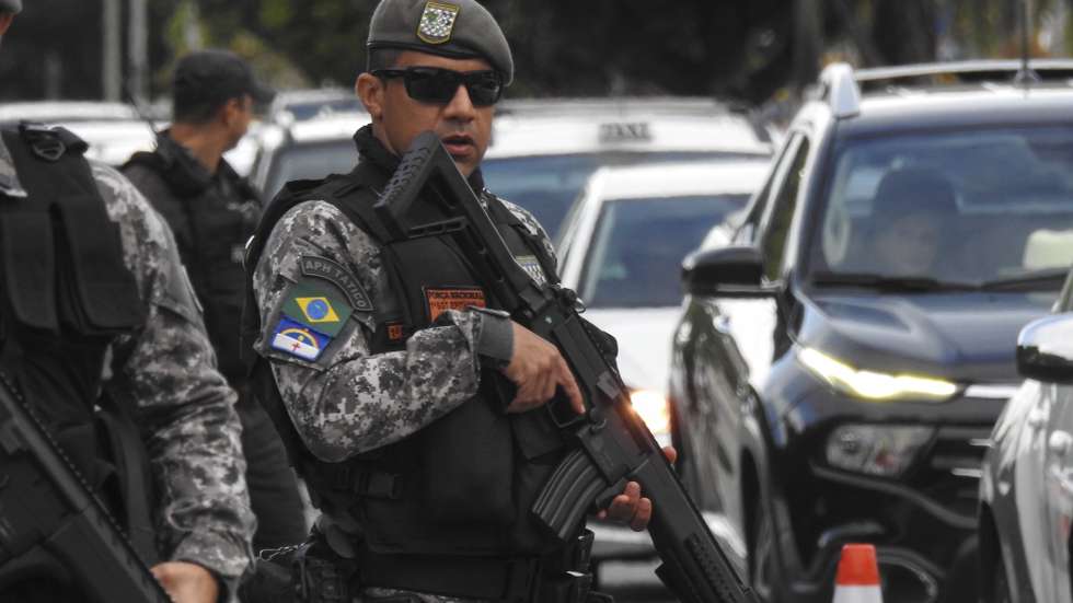 epa10525104 Agents of the National Force carry out patrols in the city of Natal, capital of the state of Rio Grande do Norte, Brazil, 15 March 2023. The Brazilian government has sent a contingent of 200 agents from the National Force, an elite police force, to reinforce security on the streets and in state prisons, after some twenty cities in Rio Grande do Norte, including the capital, Natal, reported shootings and arson against vehicles, businesses and the headquarters of public organizations during the last 48 hours.  EPA/Ney Douglas