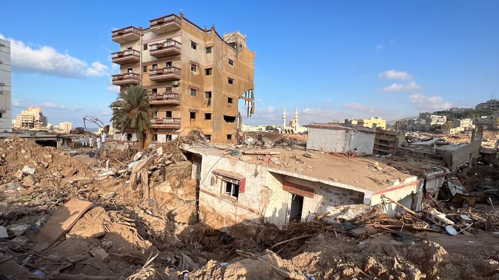 epa10865382 A view of a damaged neighborhood after Storm Daniel swept across eastern Libya, in the port city of Derna, eastern Libya, 16 September 2023. Unprecedented floods struck Libya after Mediterranean Storm Daniel made landfall on 10 September. Intense rainfall from the storm in the country's eastern region caused the collapse of two dams south of the city of Derna, sweeping away entire neighborhoods. The death toll has surpassed 11,000 and over 34,000 people have been displaced across the country. The flooding exacerbated Libya's needs, where 800,000 people are reported in need of humanitarian assistance, the International Rescue Committee (IRC) said.  EPA/STRINGER